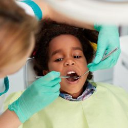 child undergoing dental treatment